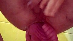 I feel intense pleasure from male squirting with two sandals fisting my stretched ass