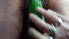 I fuck my hairy pussy with a cucumber
