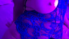 Oiled mature woman in skirt and panties watches porn, gets horny, and masturbates wildly craving intense sex