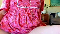 Mature woman proudly displays her huge plump shaved pussy lips spreading wide