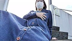 Married Japanese woman boldly masturbates outdoors in full chubby Asian wedding fantasy.