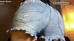 Hey, check out this fit body babe twerking and shaking her ass in mini denim shorts! 💃🍑