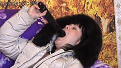 can you picture a mature milf sucking a big dildo in different positions with fur trim hood