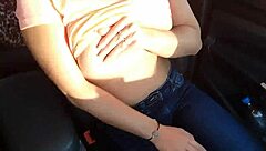 Big natural tits flash temptingly in car outdoor public display
