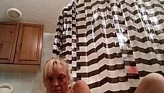 sassy brunette grabs massive dildo for intense solo fucking session. she pounds shaved pussy hard until explosive orgasm hits.