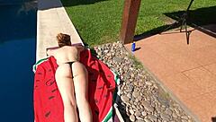 Curvy Latina woman with large chest enjoys outdoor encounter with service worker by the pool