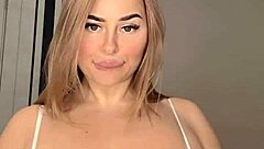 Wife Displays Huge Natural Tits In Seductive Pose Highlighting Her Voluptuous Curves And Alluring Charm For Ultimate Appeal