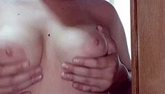 Hey, check out this sexy teen 18+ with big ass and natural tits getting sensual in front of the mirror in homemade amateur solo.