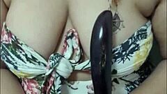 Seductive Asian milf with big natural tits and curvy body plays solo with balloon in bath