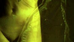 what makes this brunette so captivating in her sleek black dress?