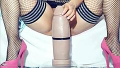 The milf handles huge dildo stretching her big Latina pussy