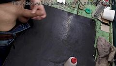 Skinny young amateur strokes huge cock solo on workbench at work