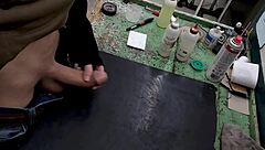 Skinny young amateur strokes huge cock solo on workbench at work