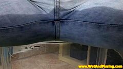 Hey, check this piss fetish babe soaking her denim pants with pee! 💦👖