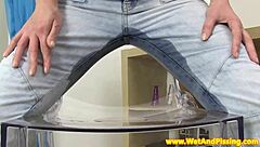 Hey, check this piss fetish babe soaking her denim pants with pee! 💦👖