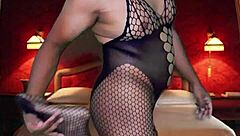 trying on full body stocking naked with blue masquerade mask collared in sexy room for bondage play