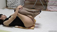 Hey, check out sexy Japanese girl Airi exercising in fishnet stockings and micro thong! 💪🩲