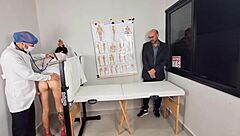 The groom takes his bride to the doctor who had to do a gynecological exam