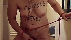 Amateur milf bound in BDSM humiliation session flashing natural tits as submissive slave in 2024.