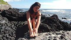 oh wow, this seductive milf's giving me foot fetish vibes right here on the public beach