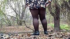 Mature milf pees doggystyle outdoors in light summer dress