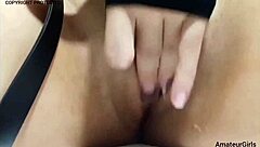 In this homemade amateur clip, a young naughty woman massages her soft wet tight pussy in pov, eagerly waiting for a hard cock to pound her deeply.