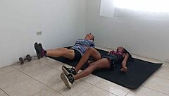 two latin girls perform acrobatic moves during workout. they flaunt big asses and exotic bodies in sensual display.