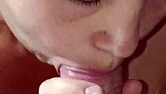 Korean wife boldly sucks cock in close-up action