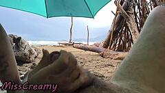 Whoa, 4K public beach handjob from Misscreamy during the storm!