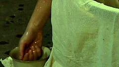 Blonde Slave Teases With Oily Bath Solo