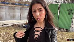 in a daring public fetish act, a girl gets cum on her face to walk through the park shocking people