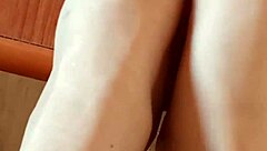 Brunette milf greta applies nail polish to her toenails in homemade amateur video