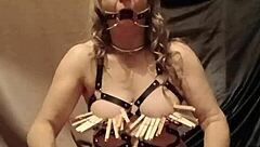 Bondage milf in leather harness and mouth spreader for solo bdsm masturbation