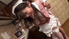 Detailed Japanese scene with hairless shaved Asian beauty experiencing intense creampie action in dedicated maid role.