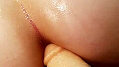 Husband uses strapon on wifes ass in bedroom play