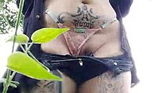 Curvy Brazilian with Pierced Nipples and Natural Tits Flashes Big Pussy Outdoors