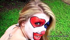 Teen in clown costume enjoys outdoor banging leading to a cumshot