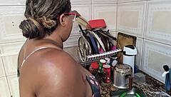 Latina milf gets huge cumshot on face in homemade kitchen scene with squirting