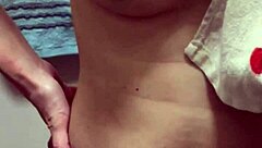 beautiful busty married woman poses nude before intimate encounter with clean nipples