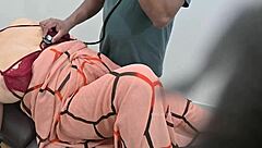 Indian Doctor Examining Lady Patient In Clinic