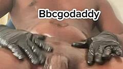 Peek at muscular black bodybuilder jerking off huge oiled cock and fucking toy in bathroom