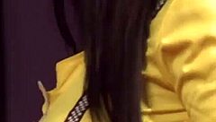 hey check out this horny brunette stripping and masturbating on stage