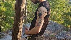 i love stroking my hairy tattooed body while jerking off outdoors in the forest