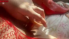 Hey, watch this curvy Latina in red body shoving dildo deep moaning wildly  