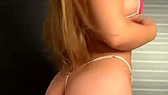 Blonde In Micro Bikini And High Heels