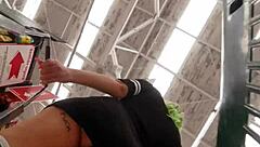 Mexican woman with big ass walks through the supermarket showing her curves