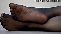 Exciting feet display in sleek nylon pantyhose!
