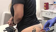 Injection in the spa for blonde client with tattoo on her butt session 2