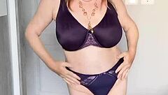 i see this busty mature milf in stockings posing closeup