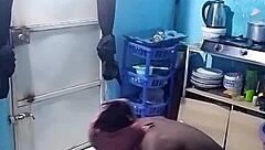 African amateur bends over in kitchen revealing big pussy lips and wet ebony slit